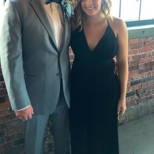 The Clothing Company black ruffle jumpsuit, size Medium.